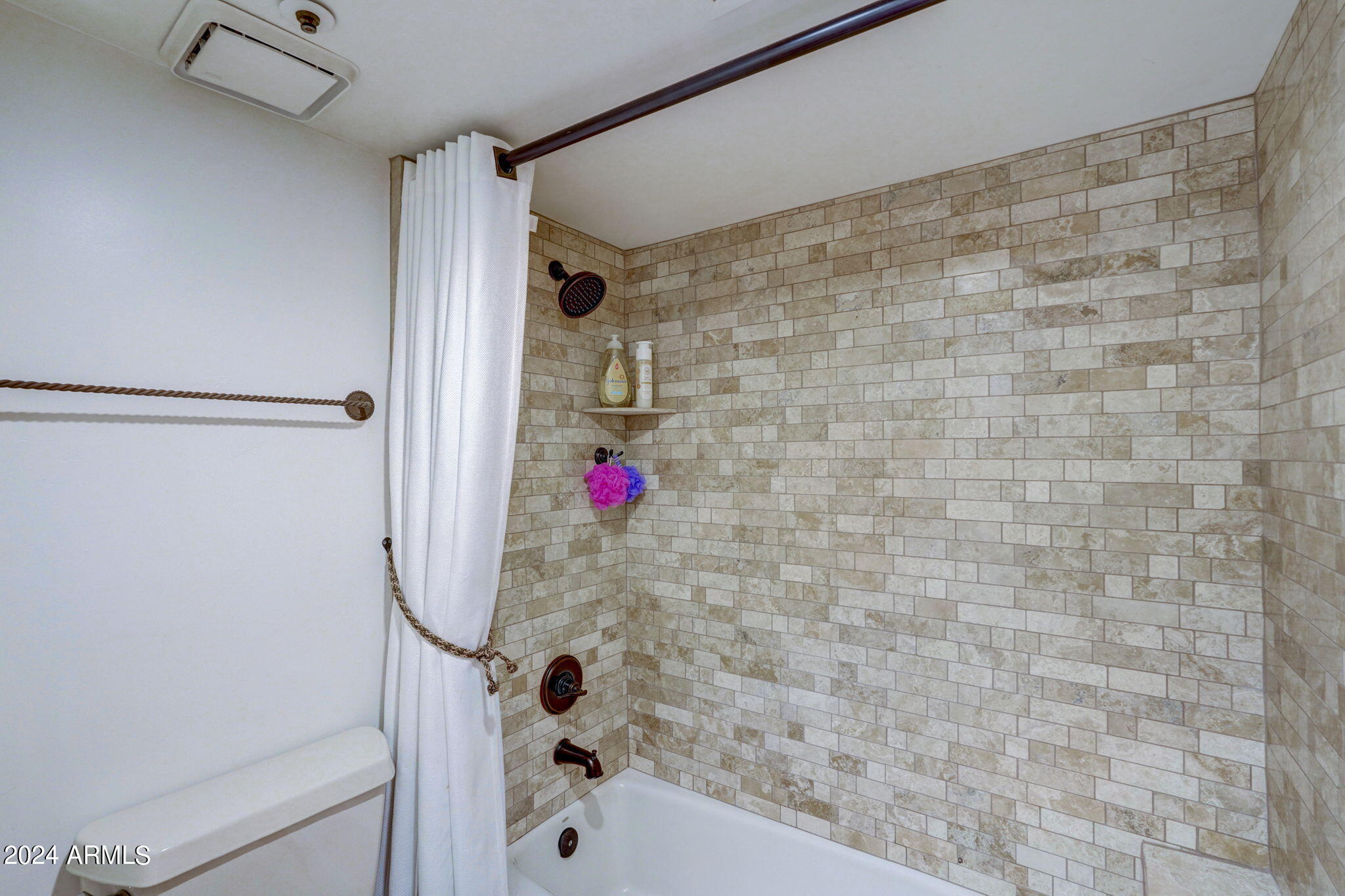 10468 East Quartz Rock Road Scottsdale, AZ 85255 - Photo 23 of 58 a bathroom with a shower