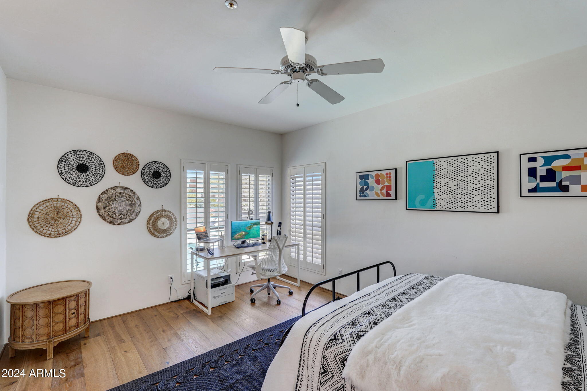 10468 East Quartz Rock Road Scottsdale, AZ 85255 - Photo 30 of 58 a bedroom with bed and a window