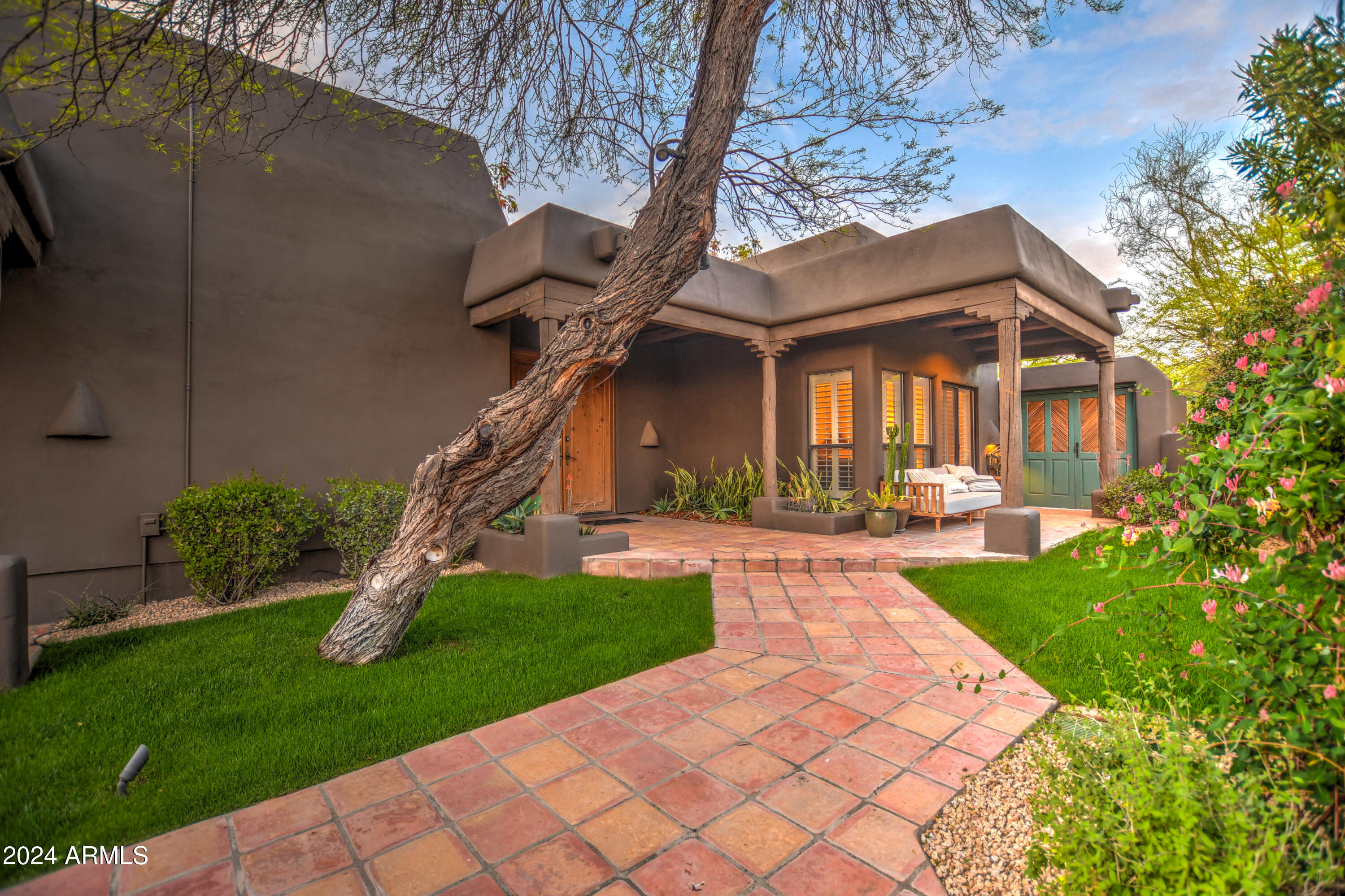10468 East Quartz Rock Road Scottsdale, AZ 85255 - Photo 41 of 58 a view of a house with a yard