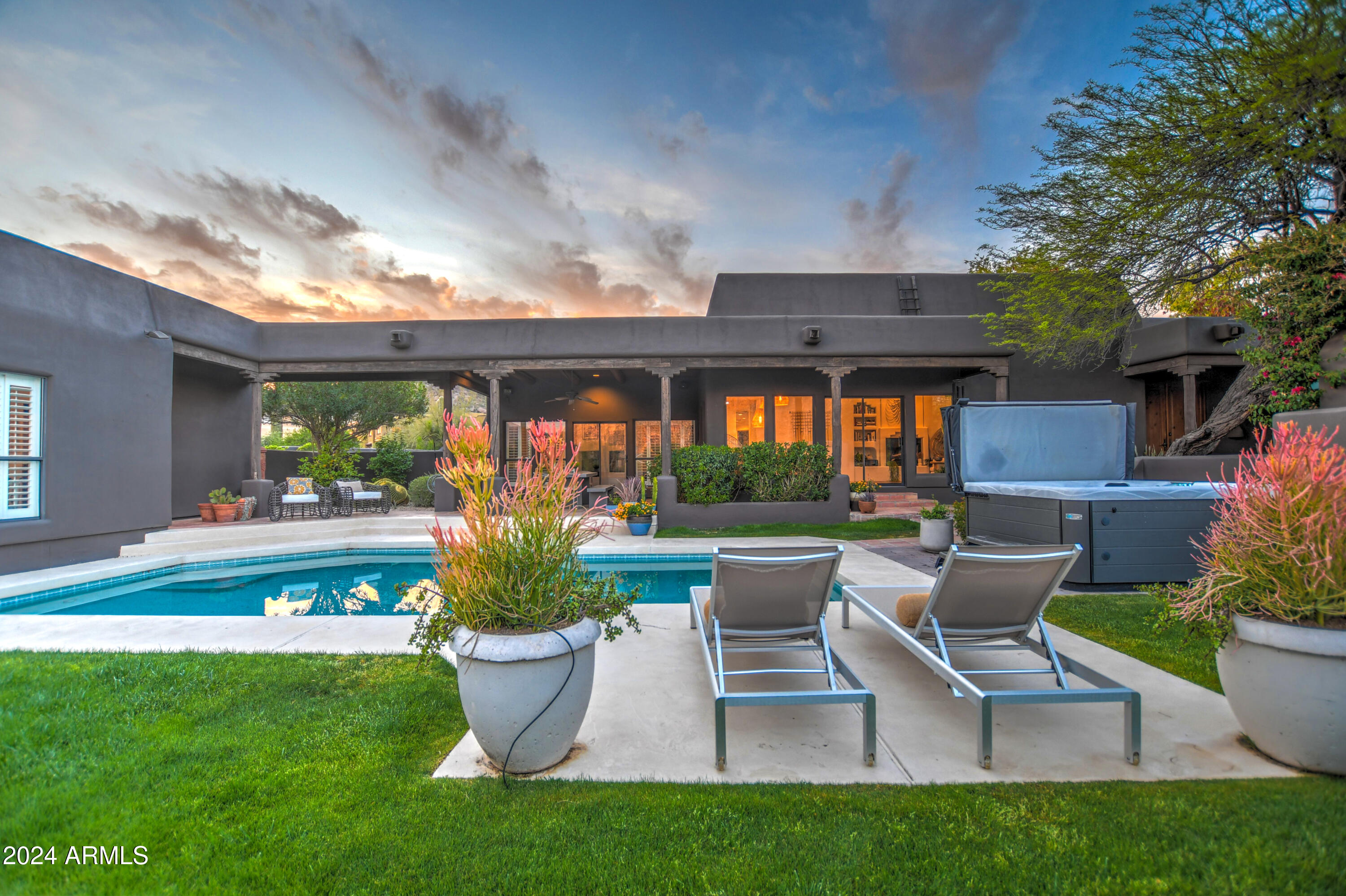 10468 East Quartz Rock Road Scottsdale, AZ 85255 - Photo 42 of 58 a view of a patio with chair and tables