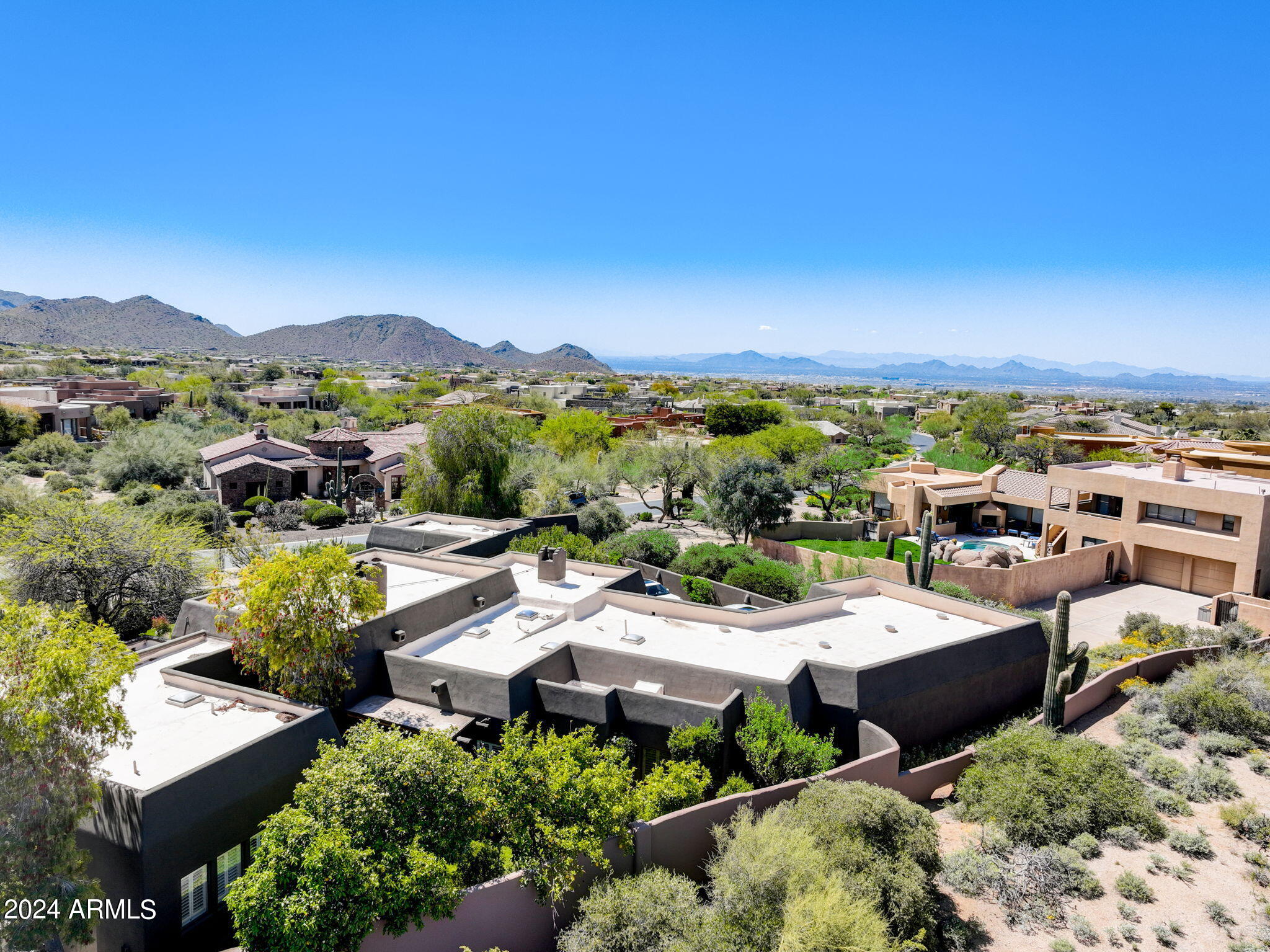 10468 East Quartz Rock Road Scottsdale, AZ 85255 - Photo 53 of 58 an aerial view of a house with a garden