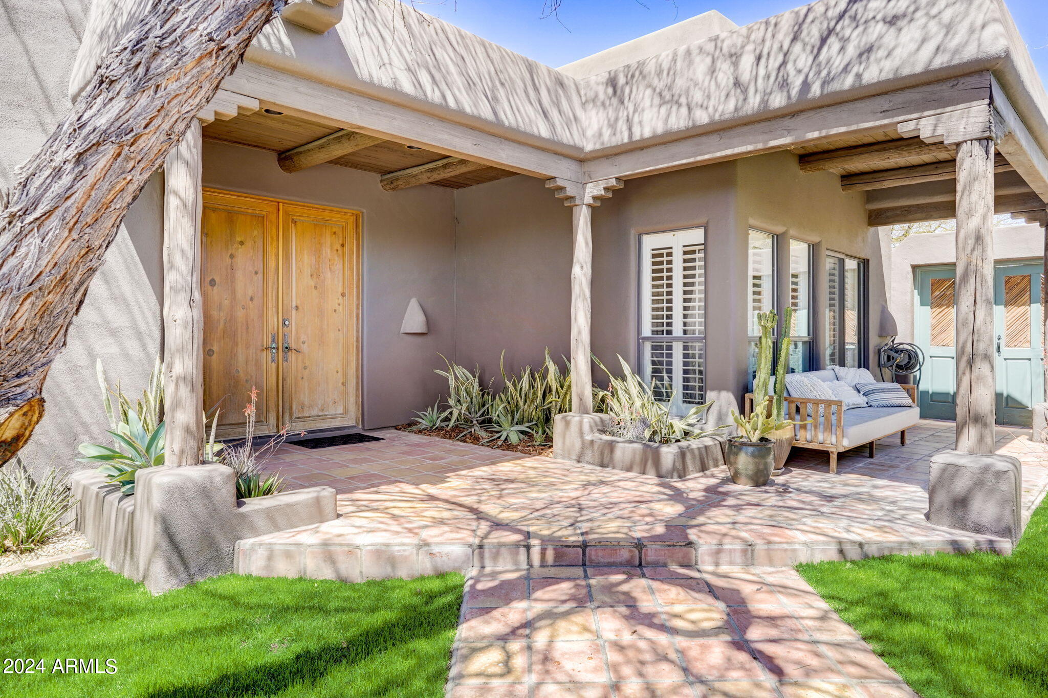 10468 East Quartz Rock Road Scottsdale, AZ 85255 - Photo 6 of 58 a backyard of a house with outdoor seating