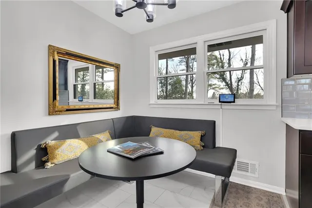 a living room with furniture and window