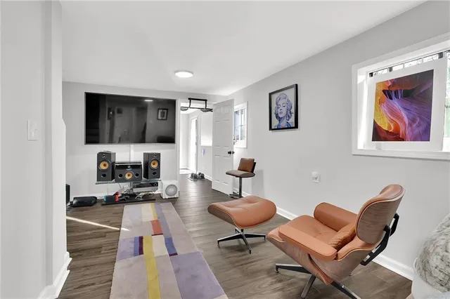 a garden with trees in the background