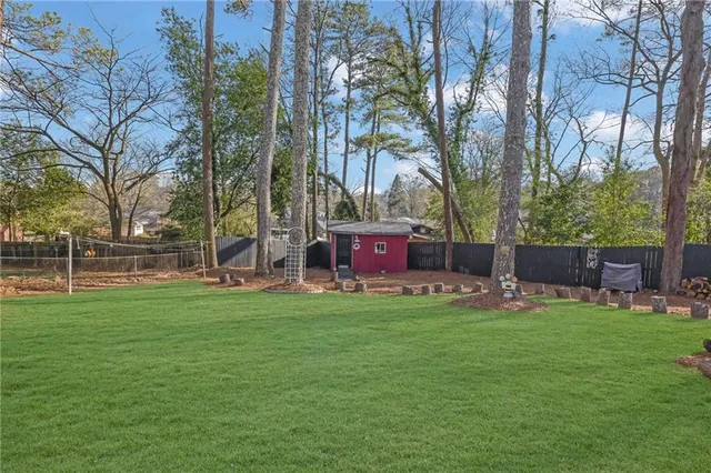 a front view of a house with yard