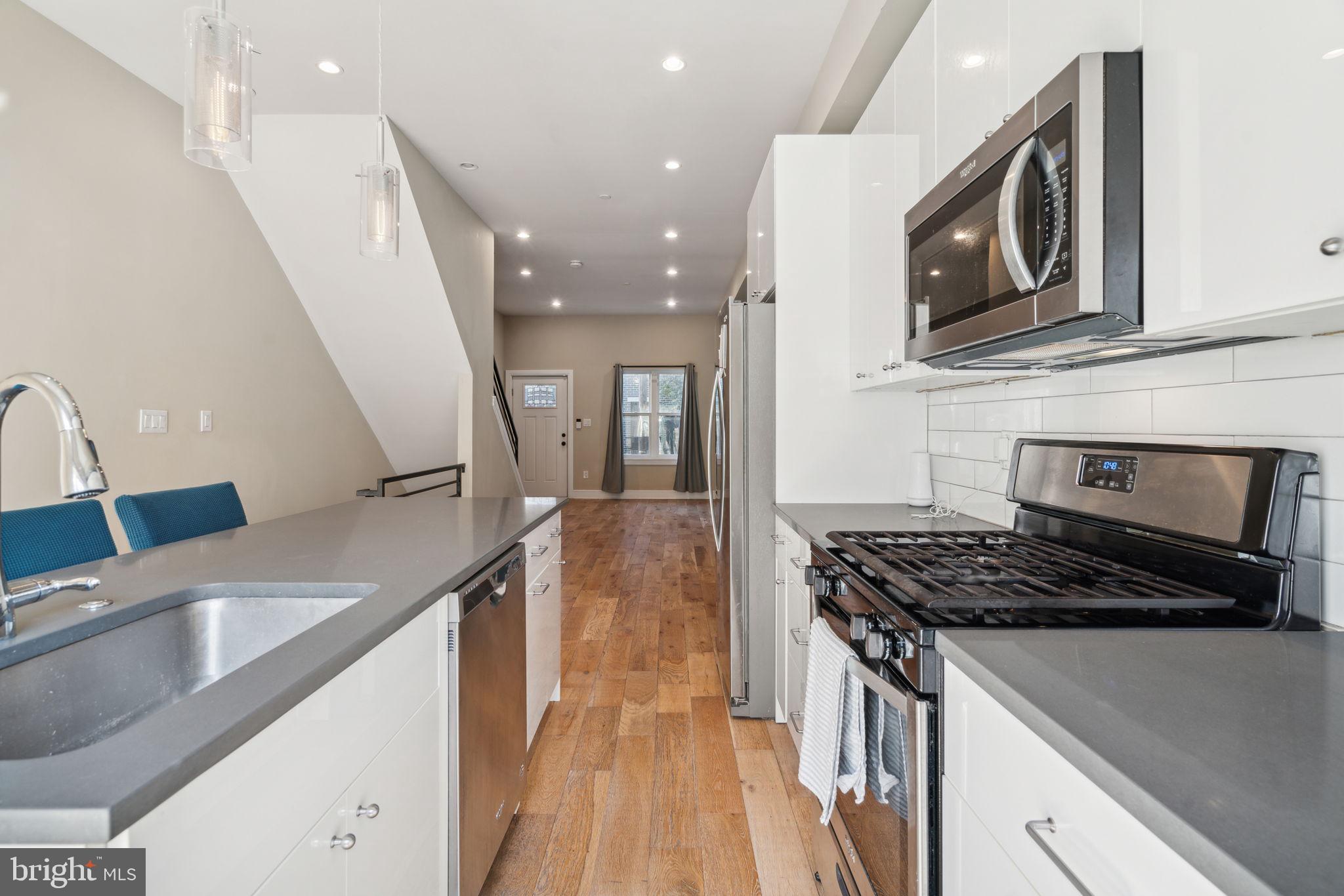 518 Mercy Street Philadelphia, PA 19148 - Photo 39 of 50 Modern kitchen with sleek finishes.