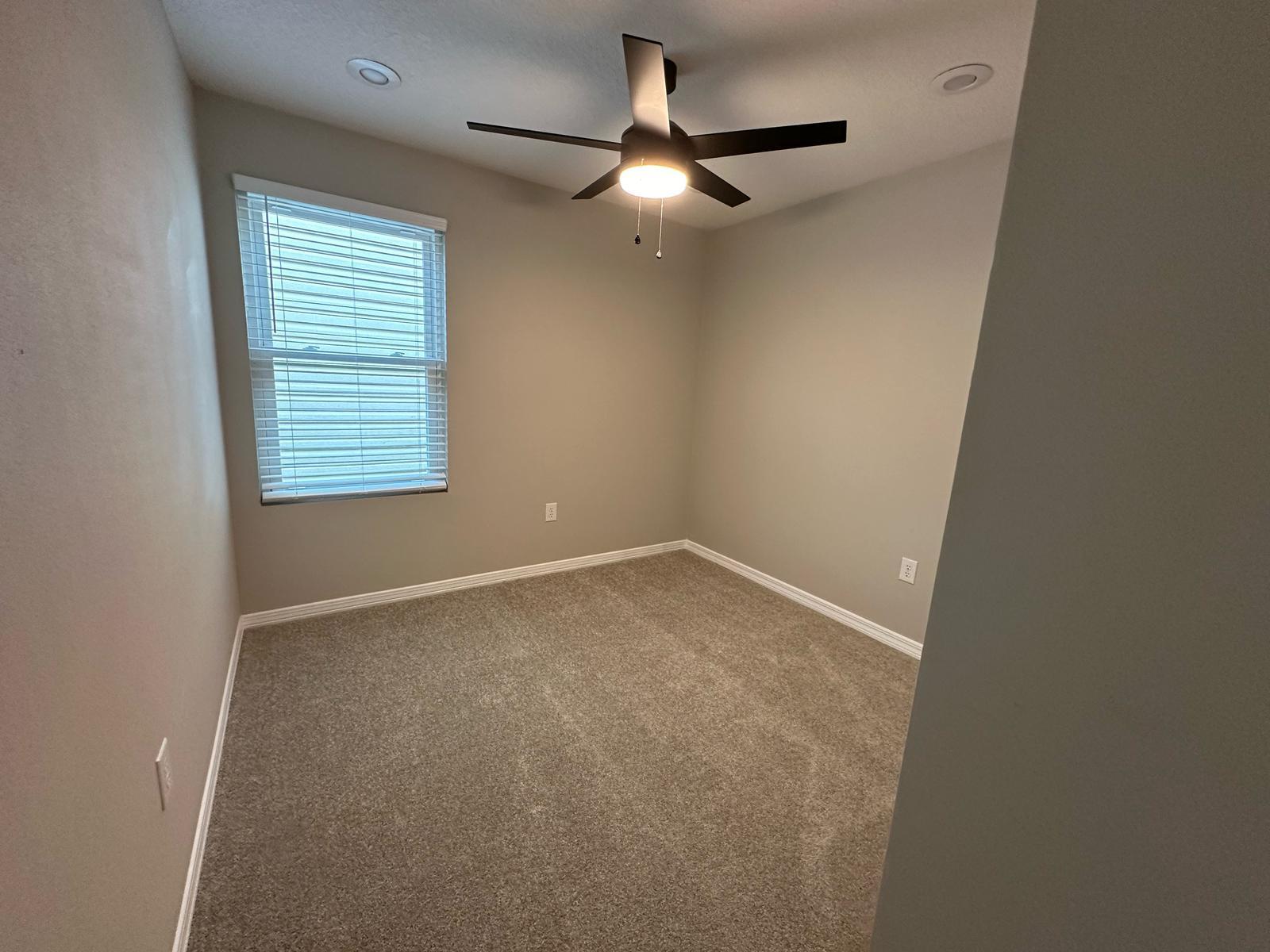1 Kelly Way Valparaiso, FL 32580 - Photo 17 of 18 an empty room with a window and a fan