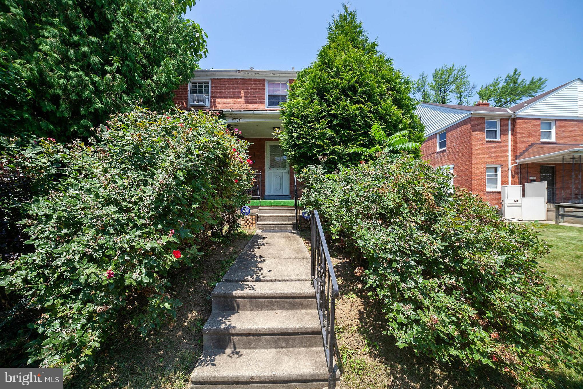 3908 Clarinth Road Baltimore, MD 21215 - Photo 2 of 23 a view of a yard in front of house