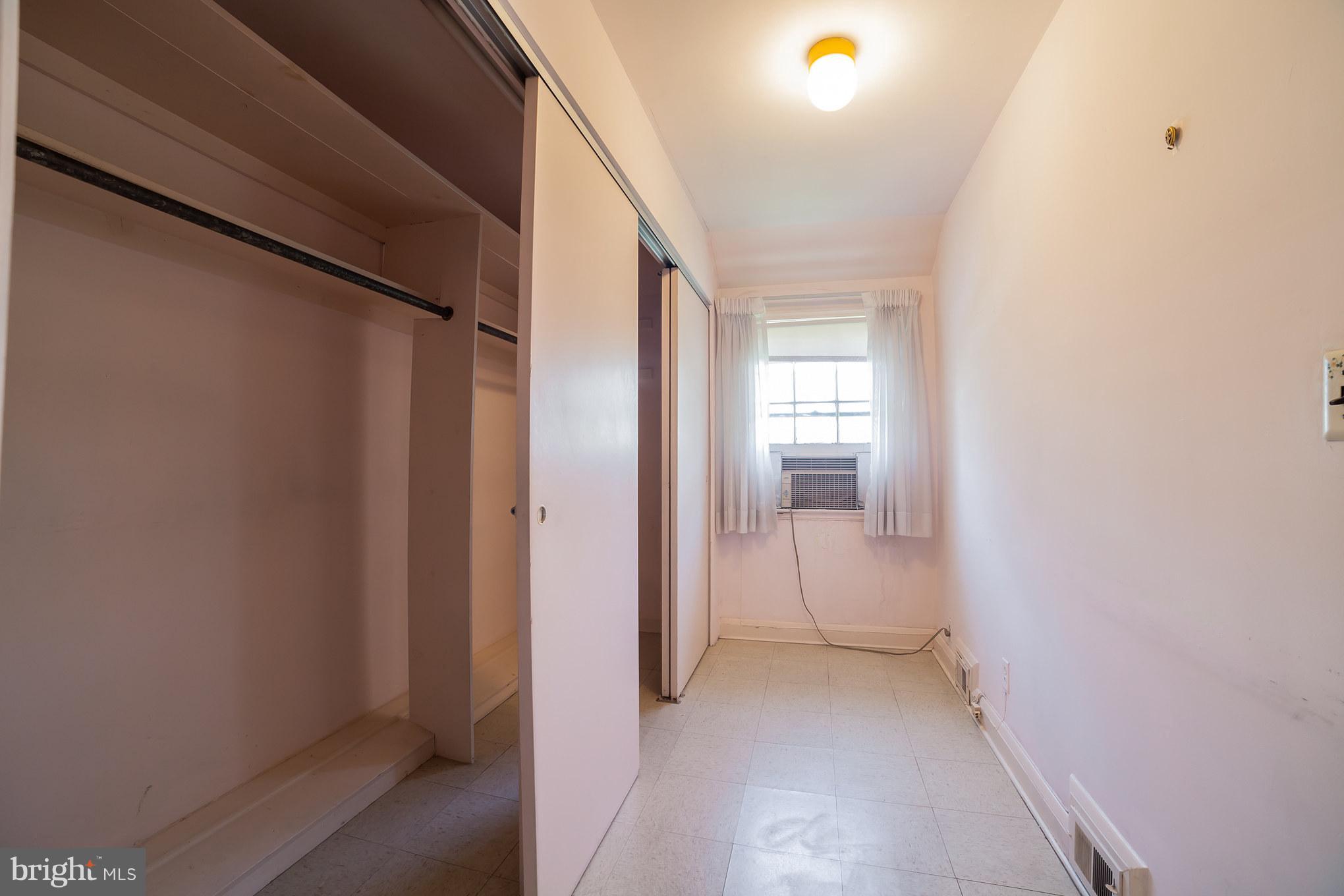 3908 Clarinth Road Baltimore, MD 21215 - Photo 21 of 23 a view of a hallway with a white walls