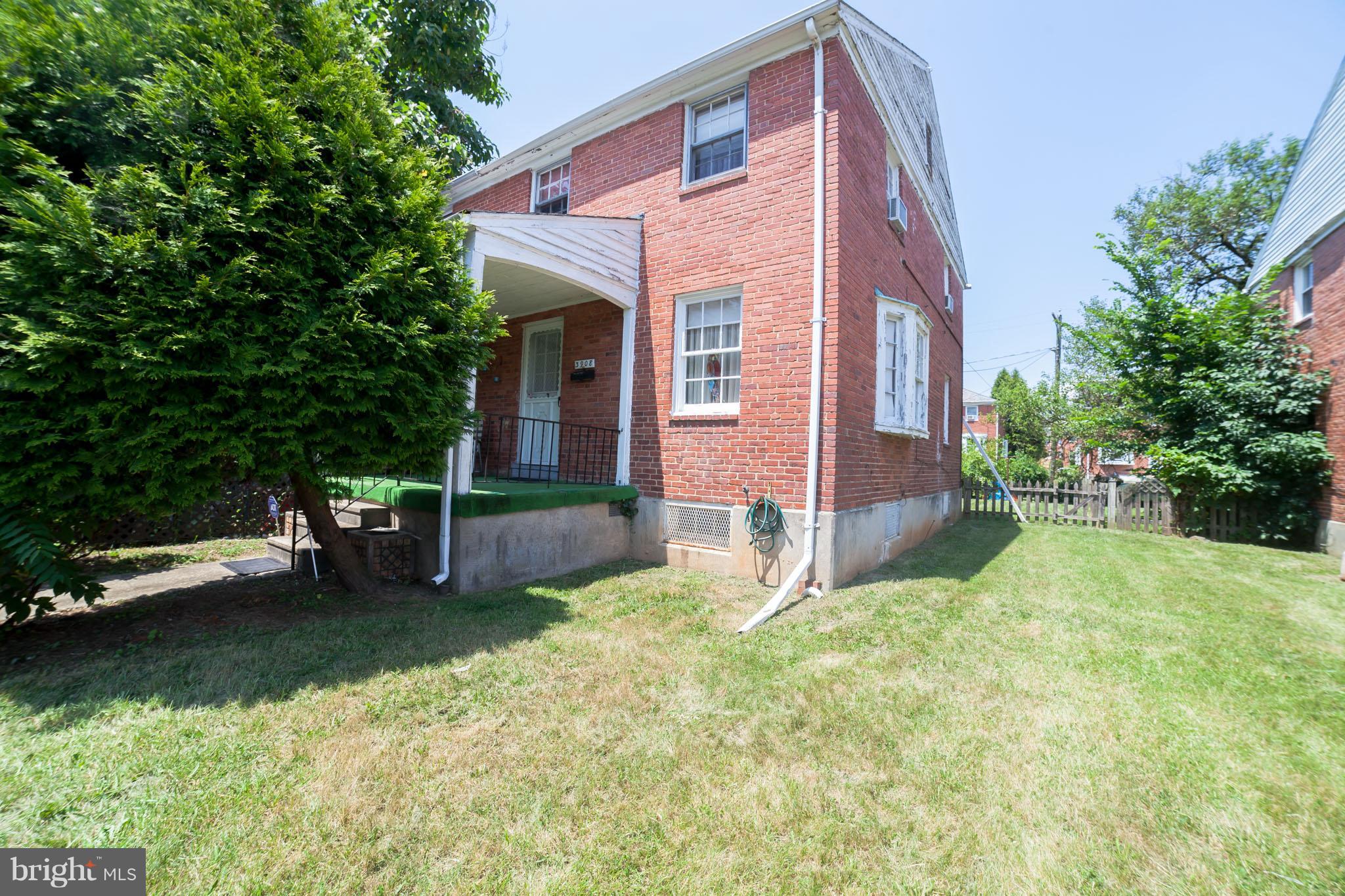 3908 Clarinth Road Baltimore, MD 21215 - Photo 4 of 23 a view of a house with backyard and sitting area