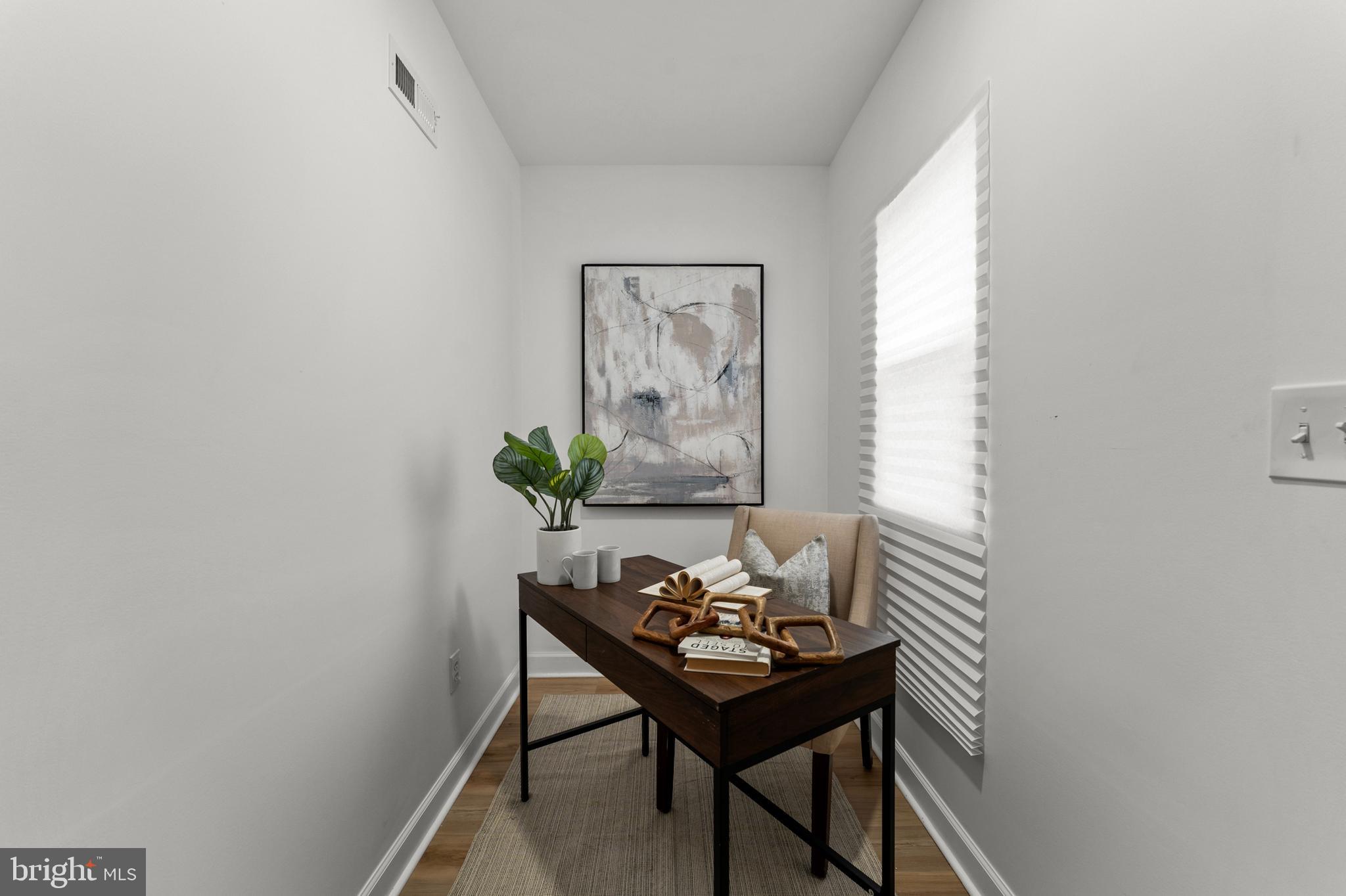 1623 Rutland Avenue Baltimore, MD 21213 - Photo 32 of 38 a view of a workspace with furniture