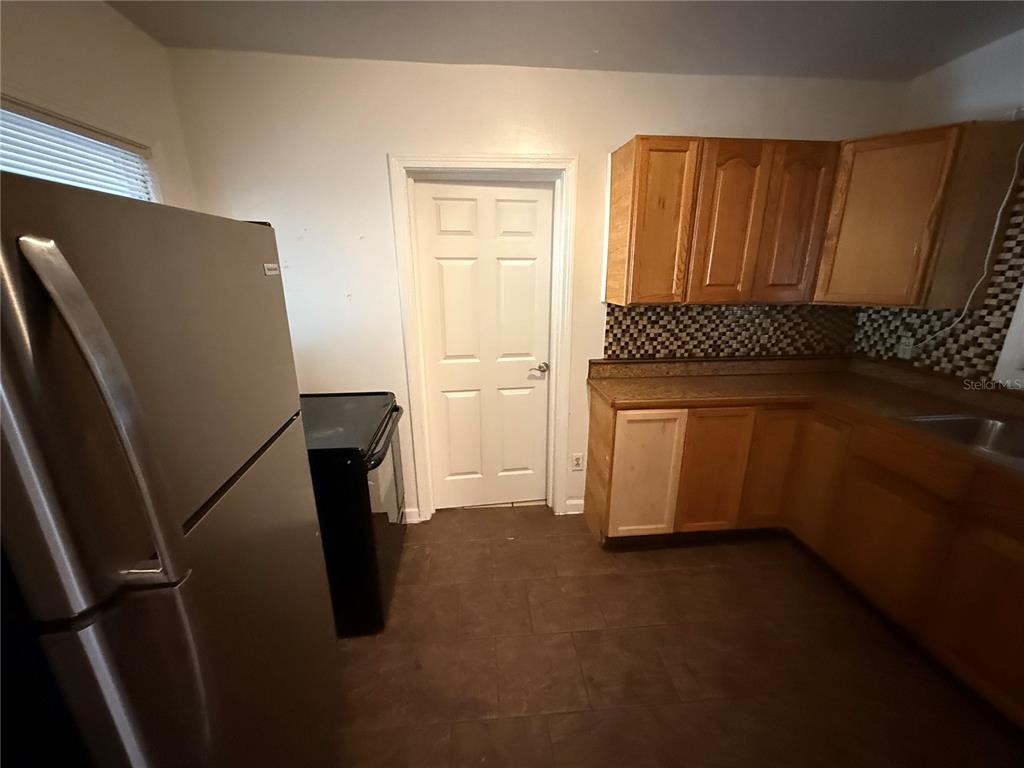 403 Northwest 25 Street Gainesville, FL 32607 - Photo 7 of 14 a utility room with dryer and washer