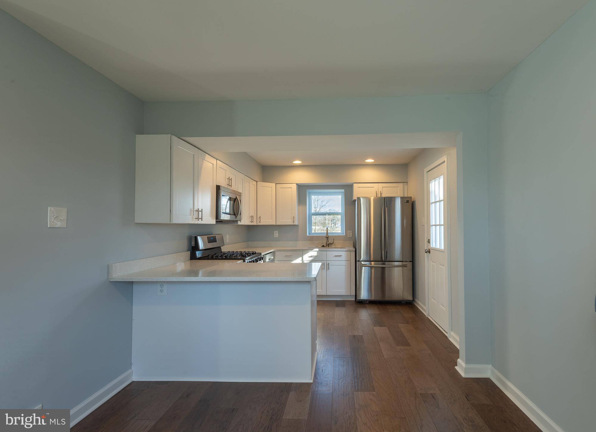 3609 Sollers Point Road Dundalk, MD 21222 - Photo 2 of 23 Large kitchen with breakfast bar