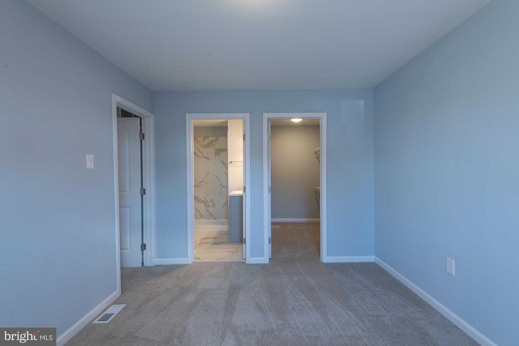 3609 Sollers Point Road Dundalk, MD 21222 - Photo 10 of 23 Master suite with walk-in closet and private bathr