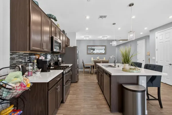 a kitchen with kitchen island granite countertop lots of counter top space