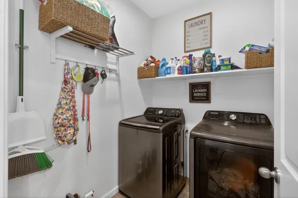 a kitchen with a stove and cabinets