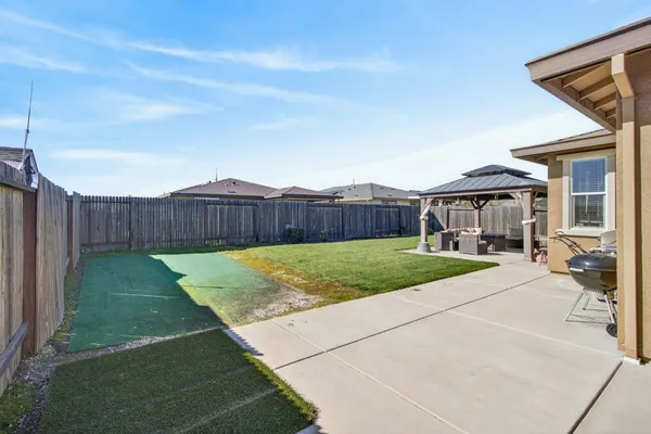 a house view with a garden space
