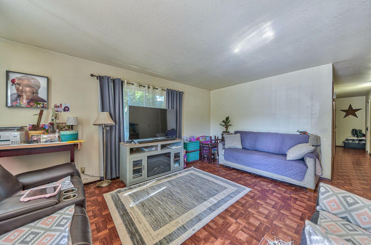 140 Inca Drive Soledad, CA 93960 - Photo 2 of 18 a living room with furniture and a flat screen tv