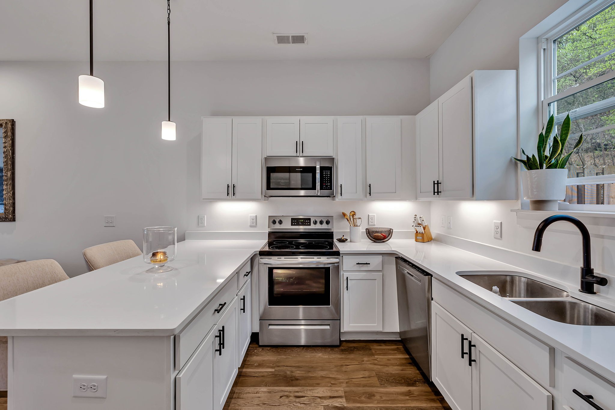 2024 Morrison Ridge Drive Nashville, TN 37221 - Photo 11 of 31 a kitchen that has a sink and a stove top oven