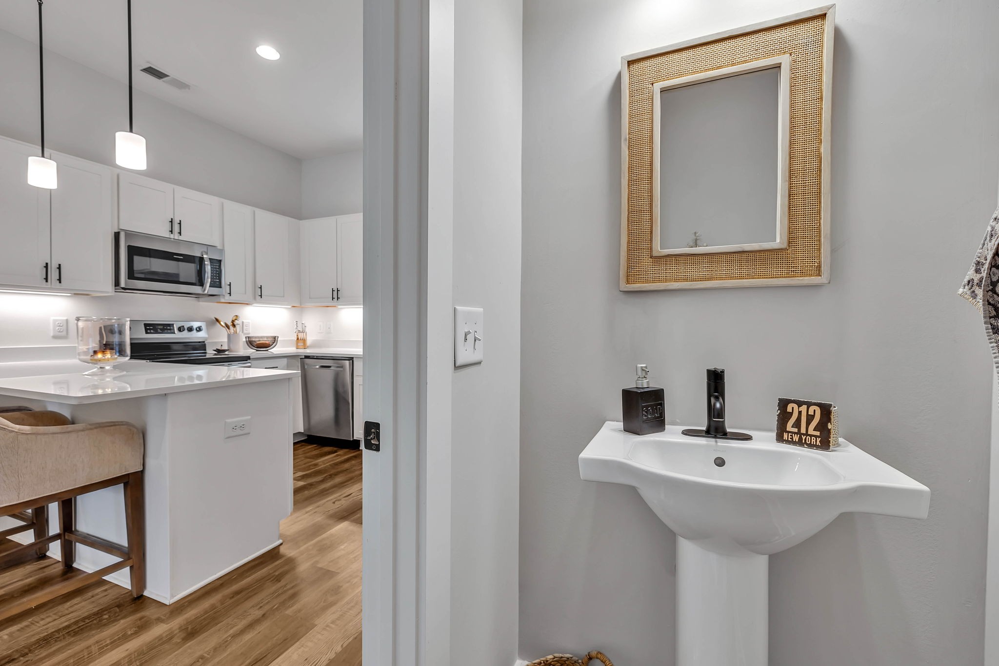 2024 Morrison Ridge Drive Nashville, TN 37221 - Photo 15 of 31 a kitchen with kitchen island a sink stainless steel appliances and cabinets