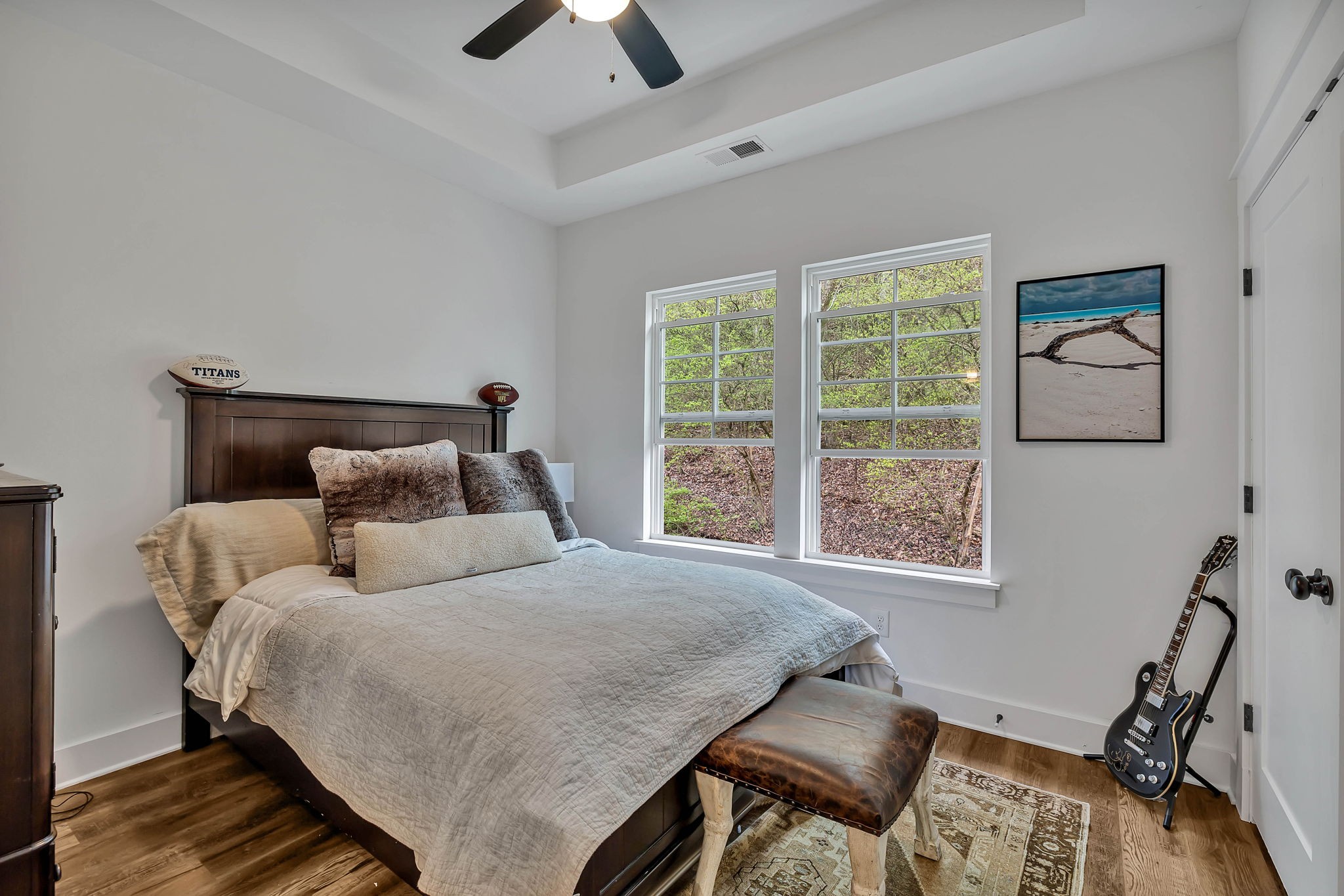 2024 Morrison Ridge Drive Nashville, TN 37221 - Photo 22 of 31 a bedroom with a bed and wooden floor