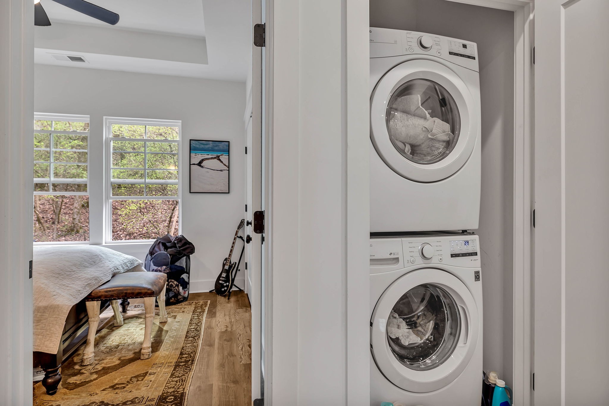 2024 Morrison Ridge Drive Nashville, TN 37221 - Photo 25 of 31 a view of a bedroom with washer and dryer