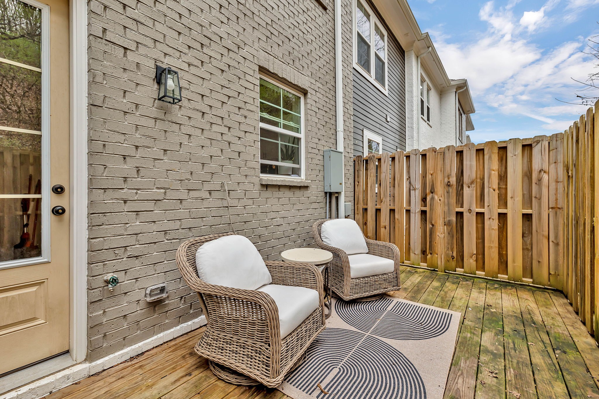 2024 Morrison Ridge Drive Nashville, TN 37221 - Photo 26 of 31 a balcony view with couple of chairs and wooden floor