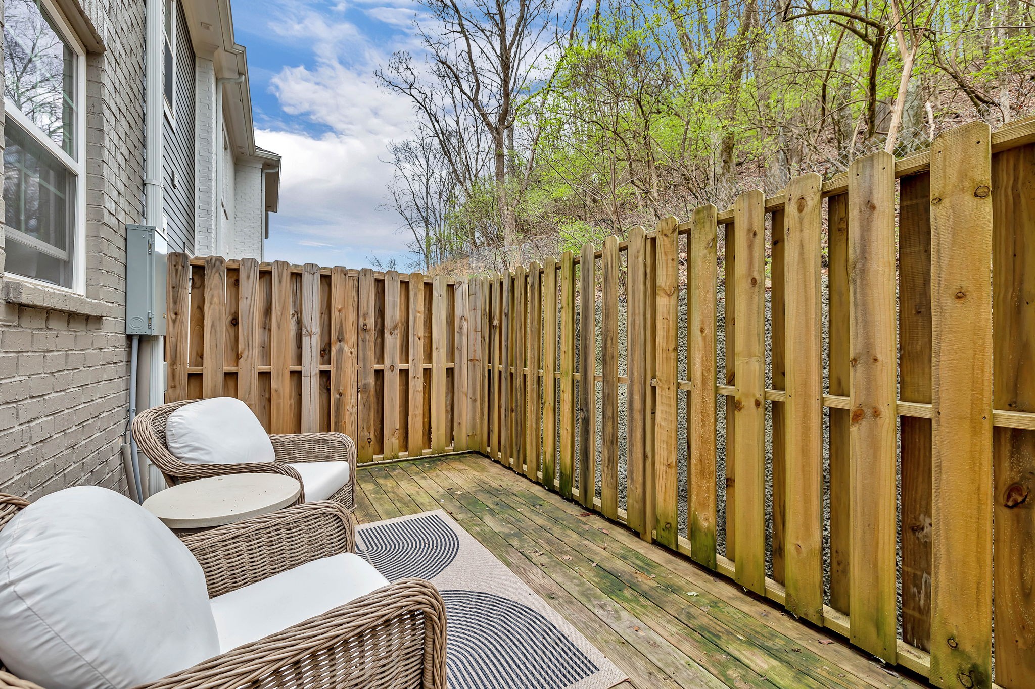 2024 Morrison Ridge Drive Nashville, TN 37221 - Photo 27 of 31 a backyard of a house with table and chairs