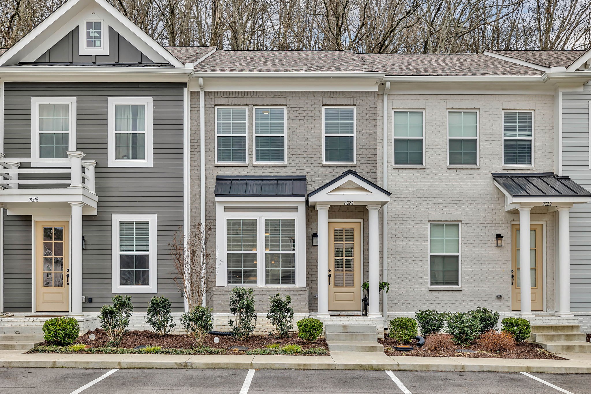 2024 Morrison Ridge Drive Nashville, TN 37221 - Photo 29 of 31 a front view of a house with a yard and garage
