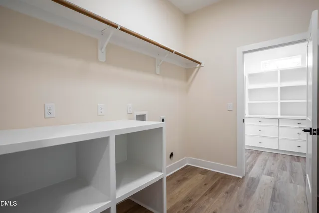 a view of an empty walk in closet