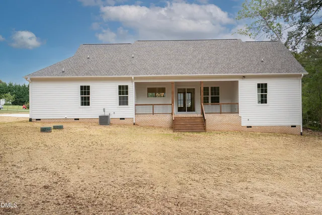 a view of a balcony with trees