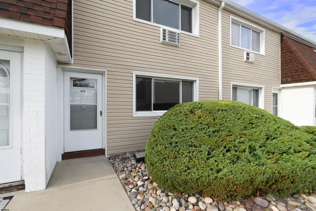 a view of an outdoor space and basketball court