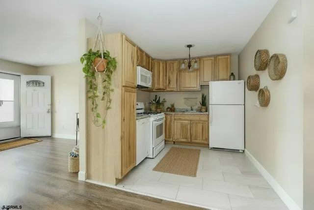 a view of a swimming pool and lounge chair