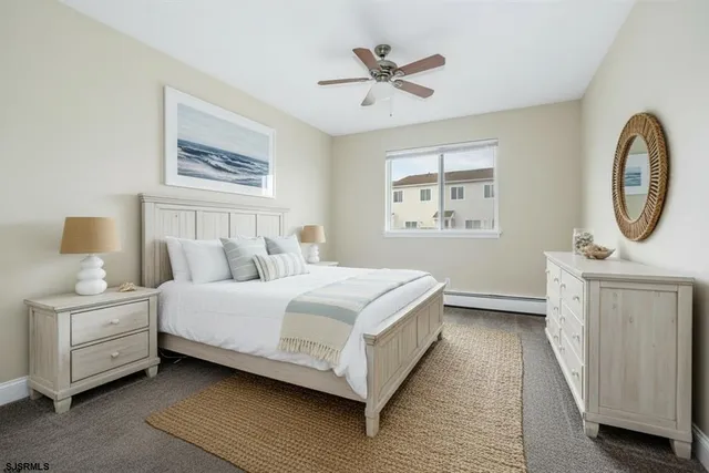 a view of swimming pool with outdoor seating and city view
