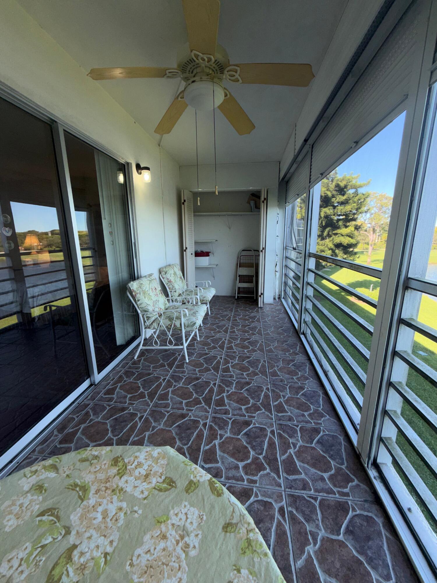 3058 Ainslie Drive, Unit 3058D Boca Raton, FL 33434 - Photo 8 of 13 Porch closet