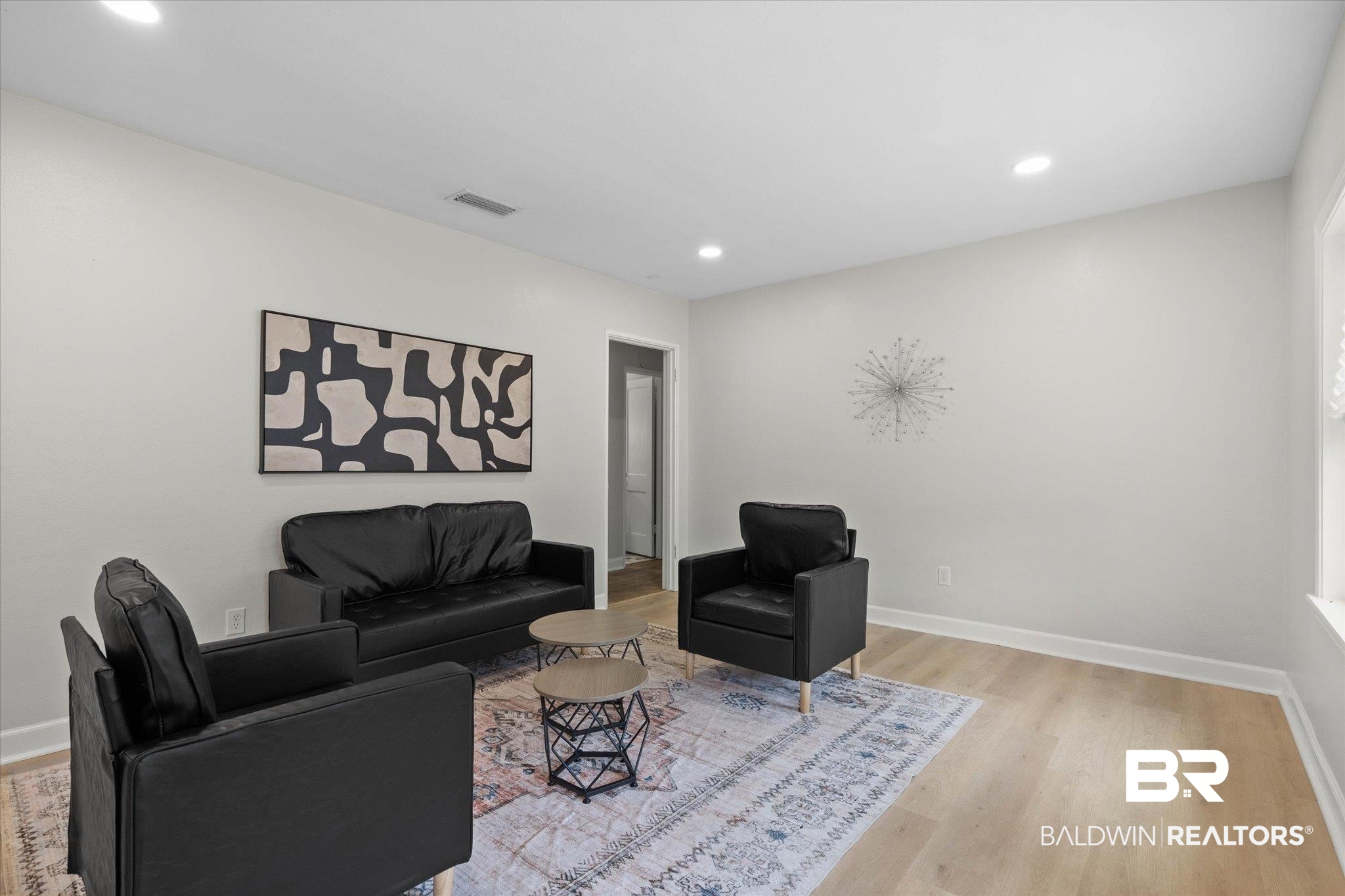 3512 Spring Hill Avenue Mobile, AL 36608 - Photo 2 of 20 Living area featuring wood finished floors and recessed lighting