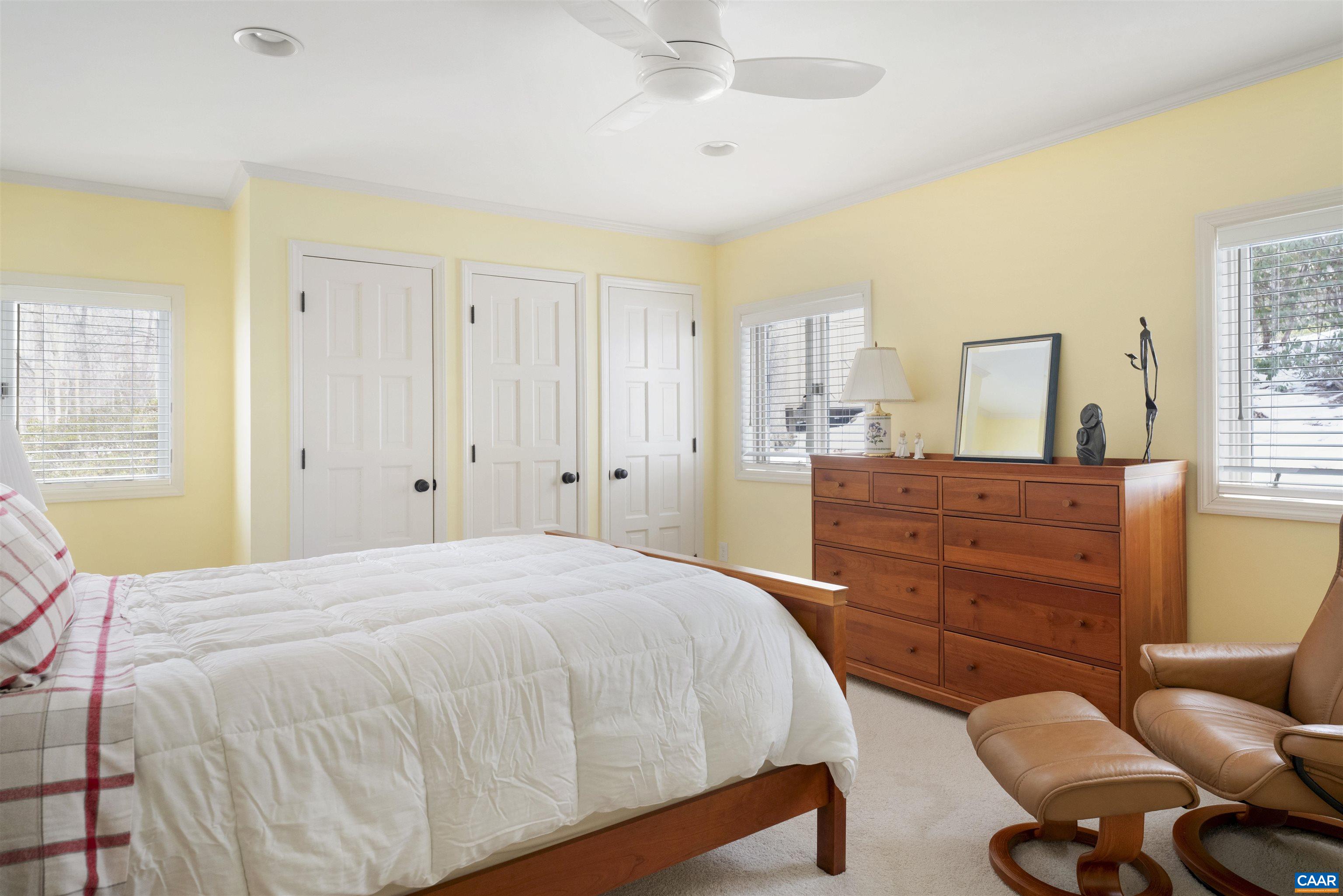 2330 Whippoorwill Road Charlottesville, VA 22901 - Photo 35 of 62 a bedroom with a bed and a dresser