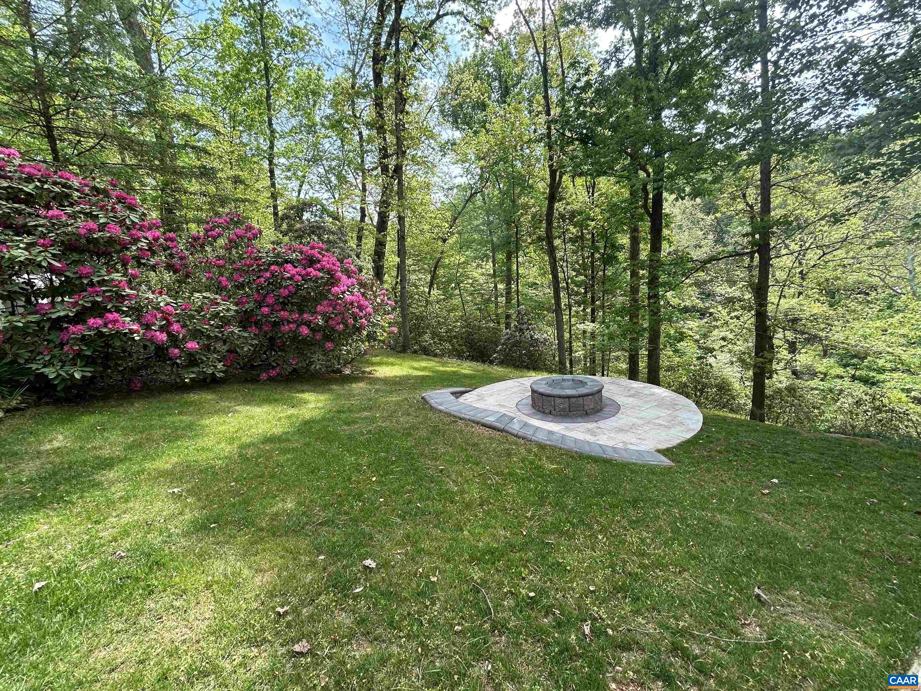 2330 Whippoorwill Road Charlottesville, VA 22901 - Photo 54 of 62 a view of a table and chairs in the garden