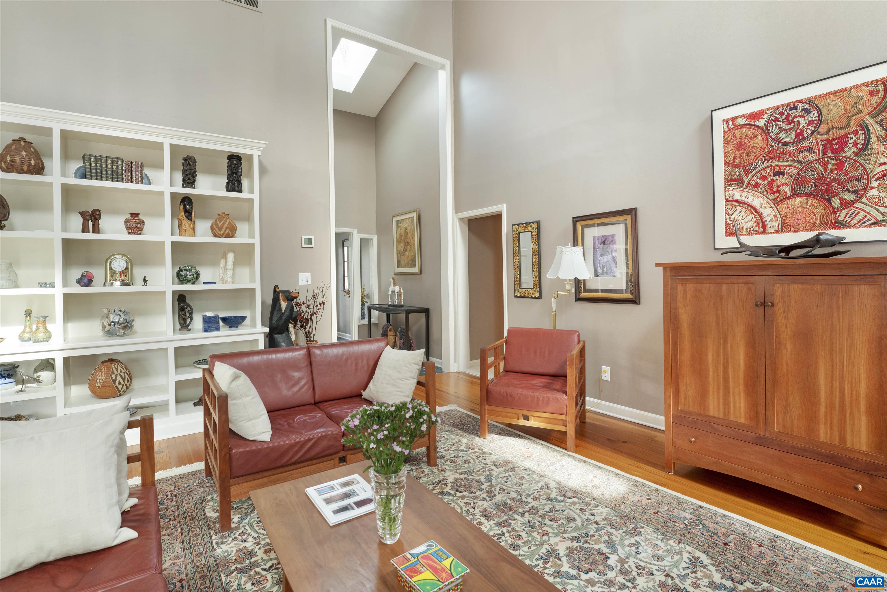 2330 Whippoorwill Road Charlottesville, VA 22901 - Photo 8 of 62 a living room with furniture and a rug