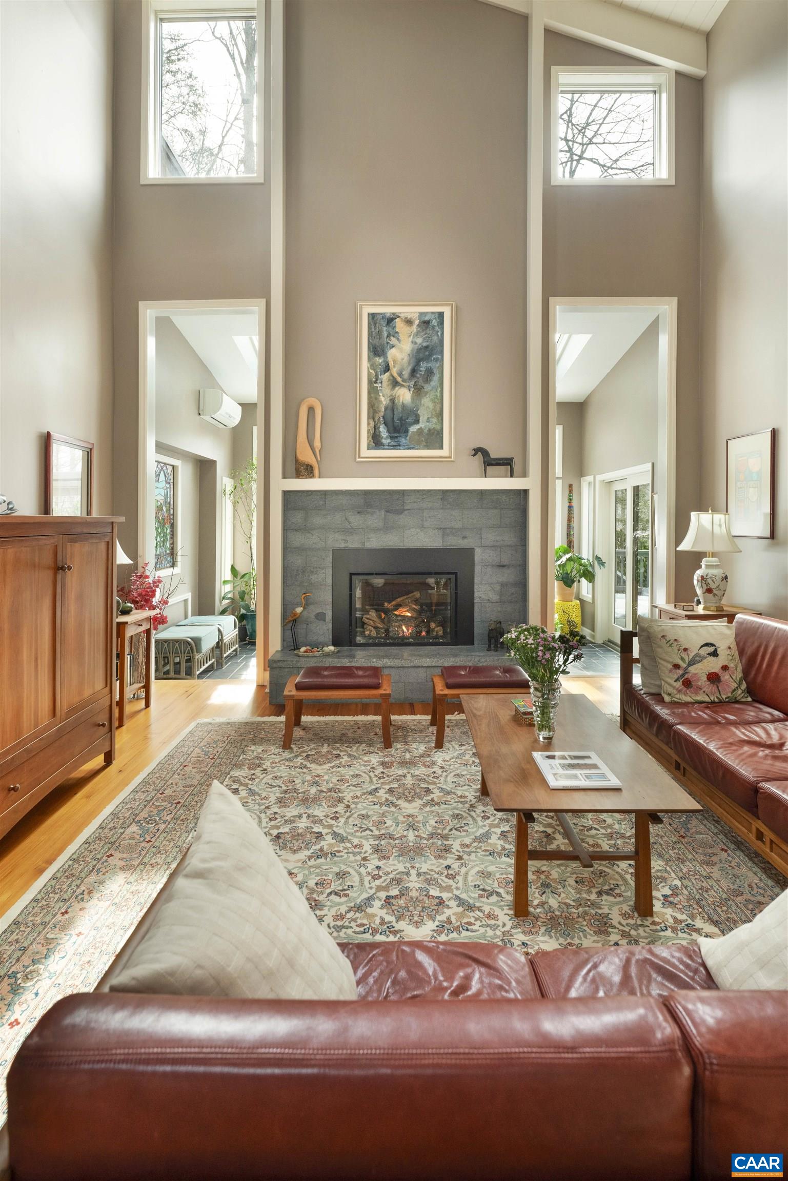 2330 Whippoorwill Road Charlottesville, VA 22901 - Photo 10 of 62 a living room with furniture and a fireplace