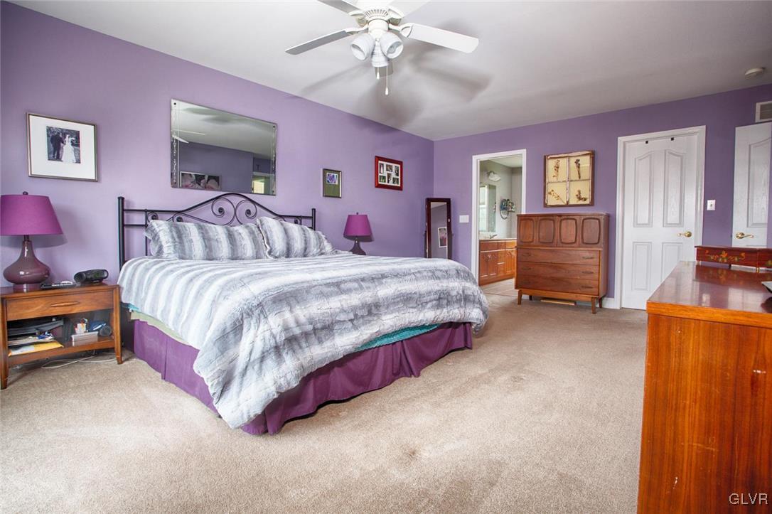 207 Bushkill Terrace Nazareth, PA 18064 - Photo 10 of 25 a bedroom with a bed and dresser