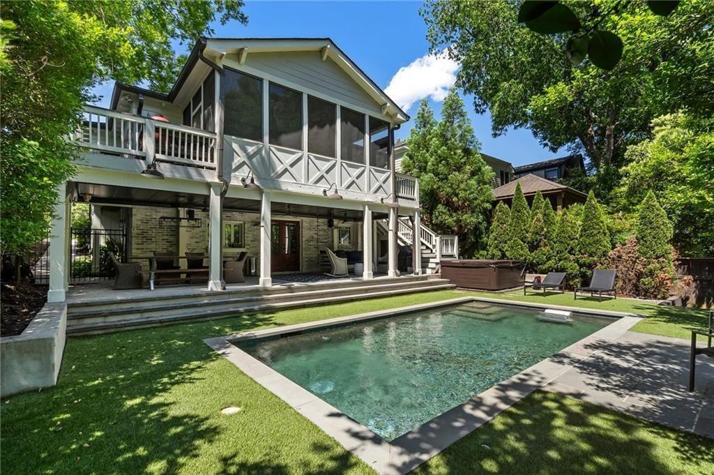 a view of a house with a swimming pool