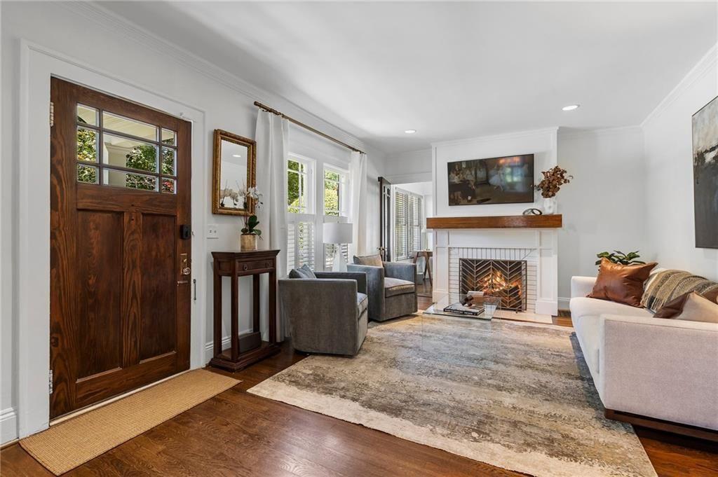 663 Yorkshire Road Northeast Atlanta, GA 30306 - Photo 11 of 85 a living room with furniture and a fireplace