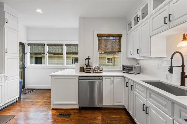 a bedroom with bed and a window