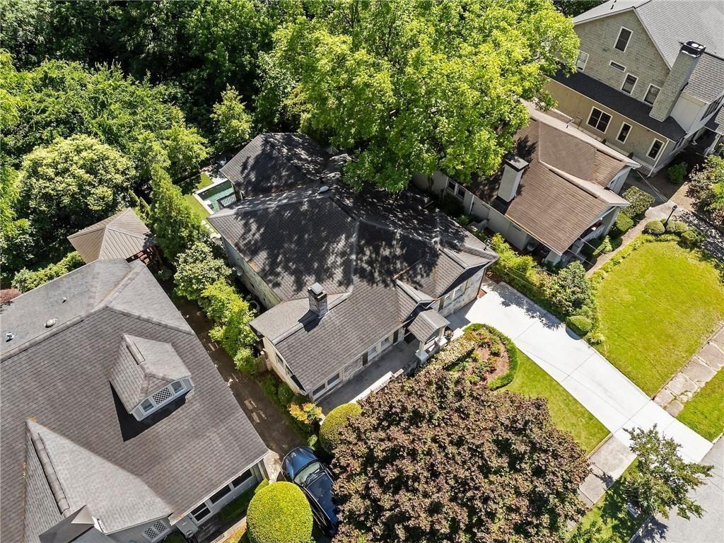 663 Yorkshire Road Northeast Atlanta, GA 30306 - Photo 5 of 85 an aerial view of a house with a swimming pool