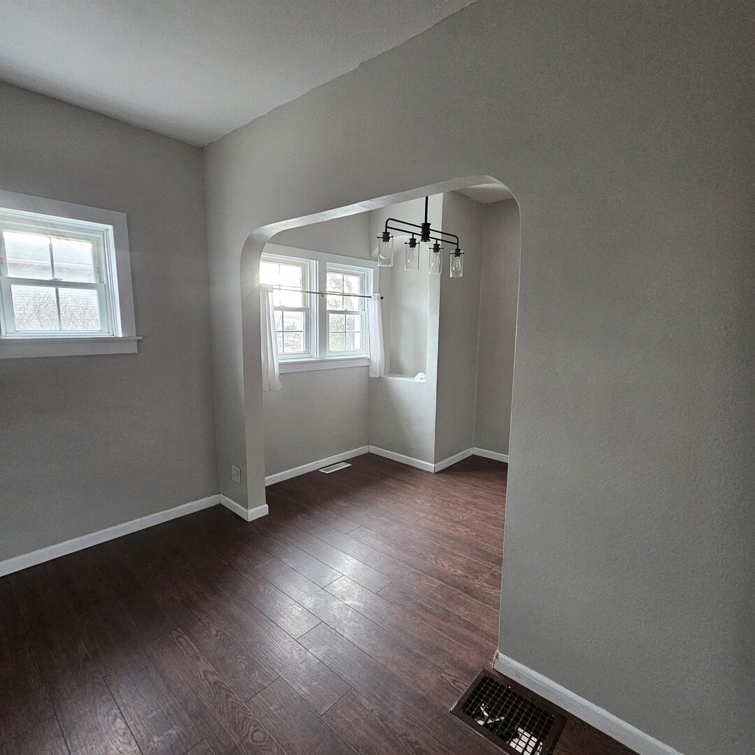 14027 North Link Lane Mount Vernon, IL 62864 - Photo 12 of 28 an empty room with wooden floor and windows