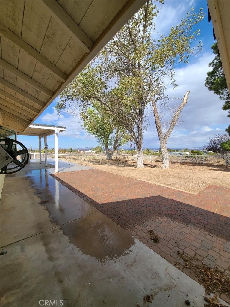8725 Monte Vista Road Phelan, CA 92371 - Photo 18 of 31 a view of a backyard of the house
