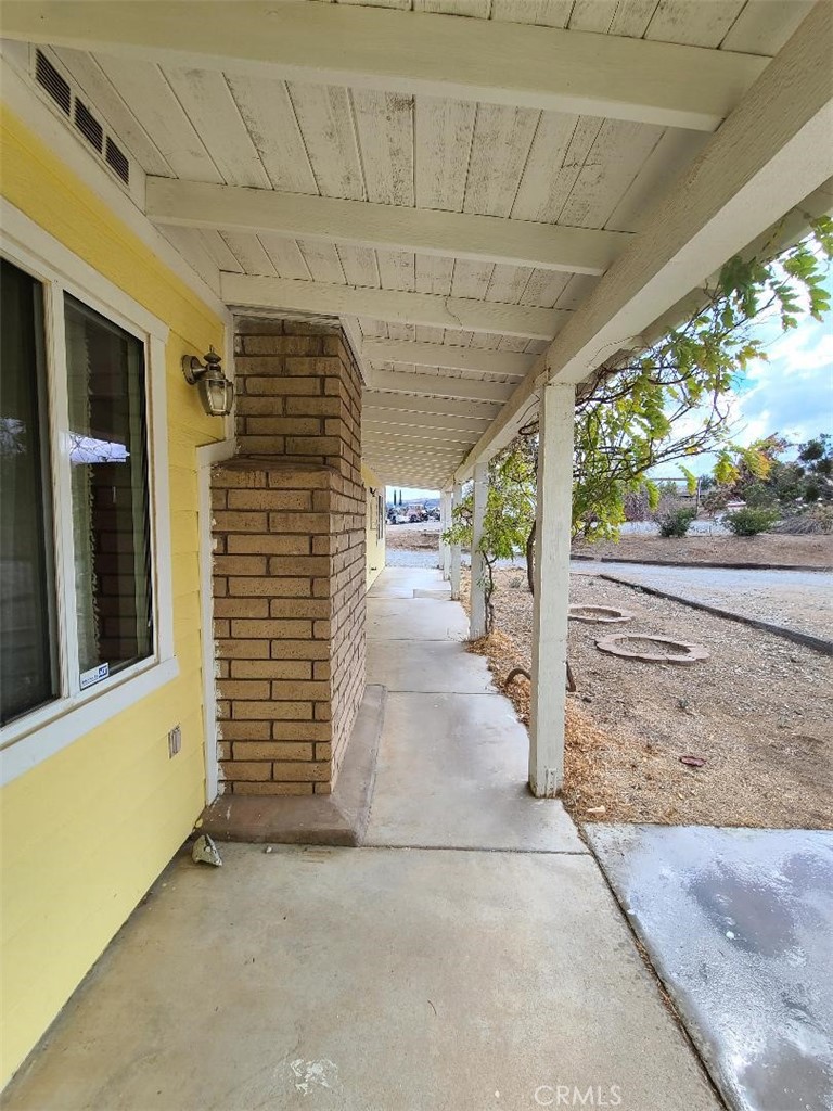 8725 Monte Vista Road Phelan, CA 92371 - Photo 24 of 31 a view of a porch