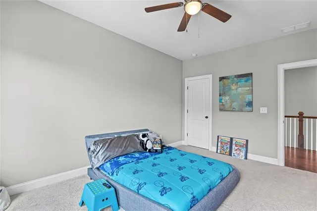 a view of a bedroom and a bed