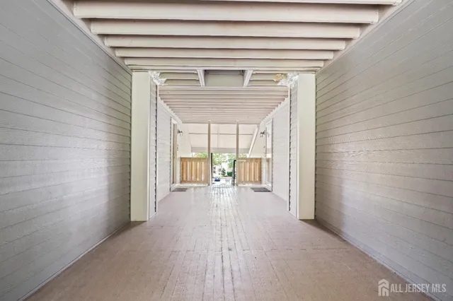 a view of a park with large trees